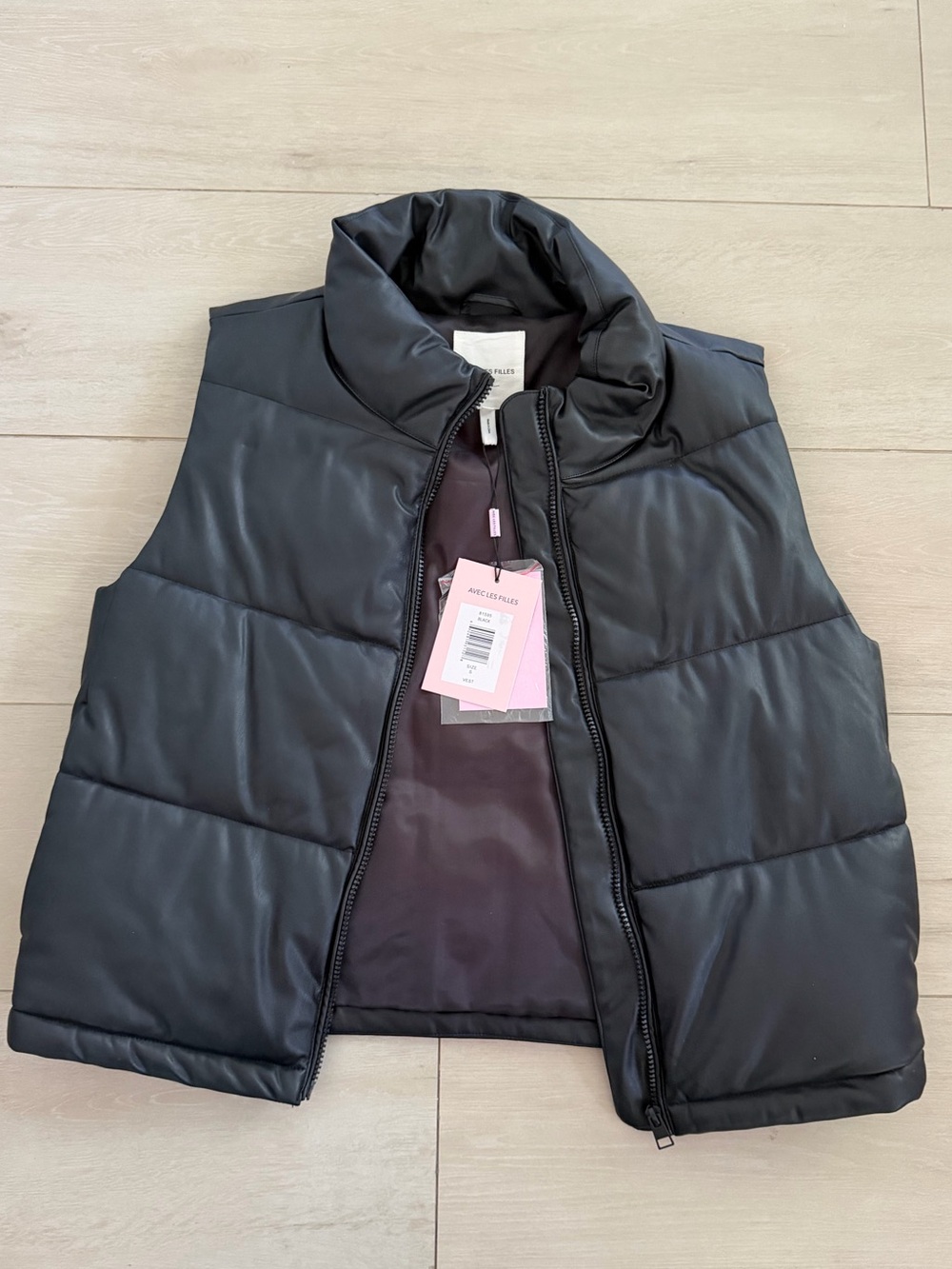 black faux leather puffer vest by Avec Les Filles